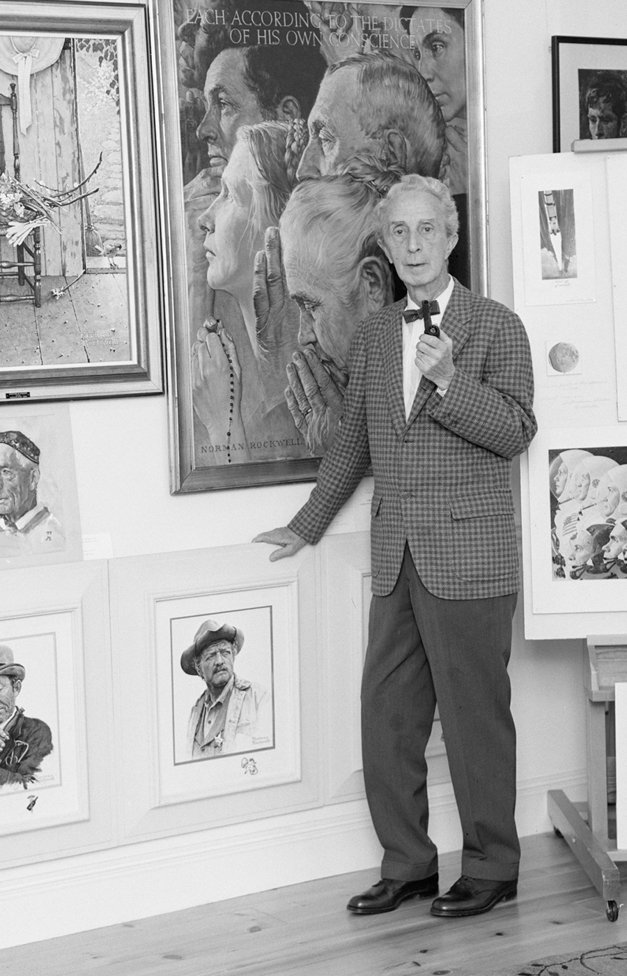 Norman Rockwell with his Paintings